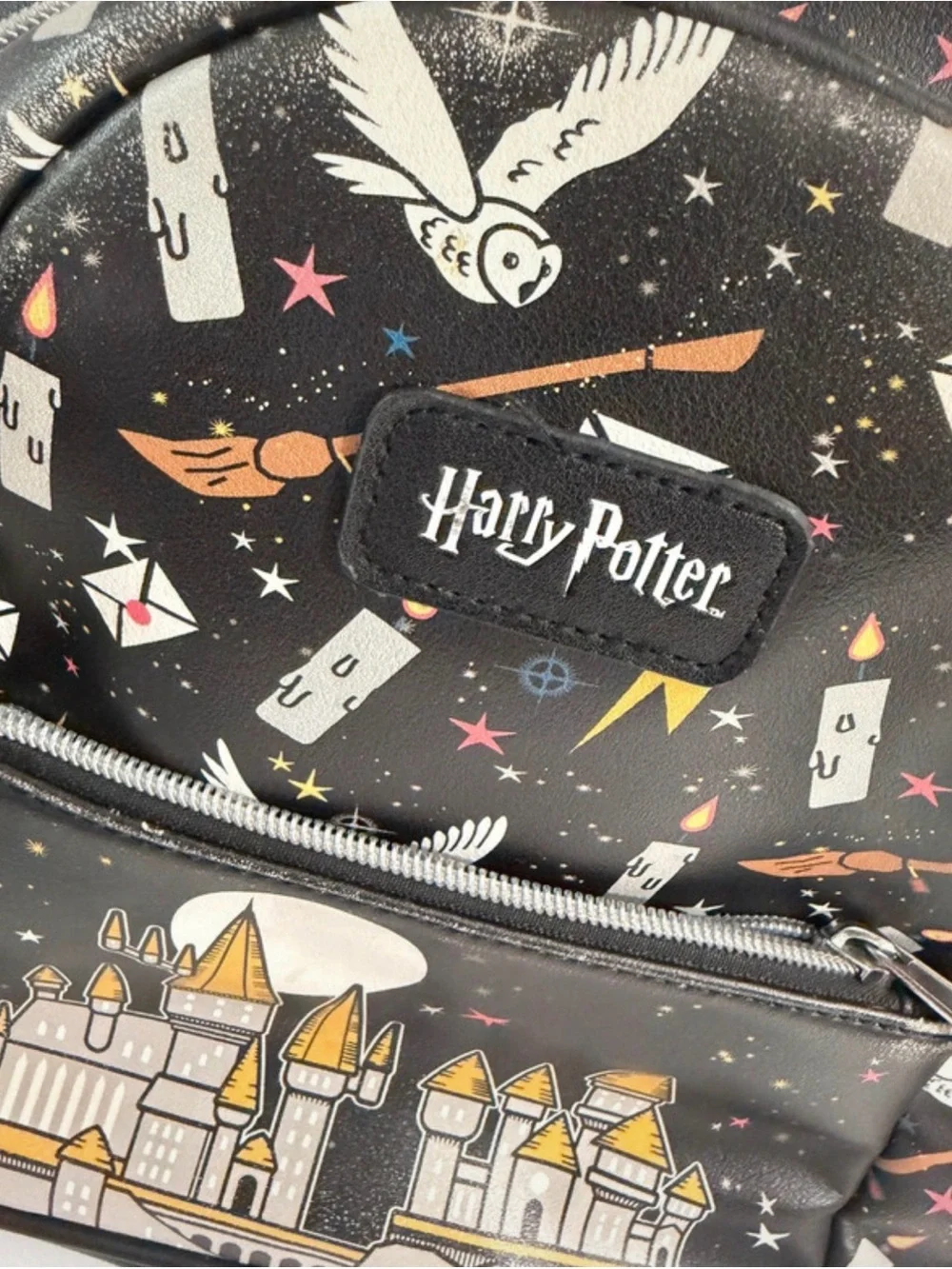 Warner Bros. Harry Potter Black Mini Backpack with Gold & White Accents